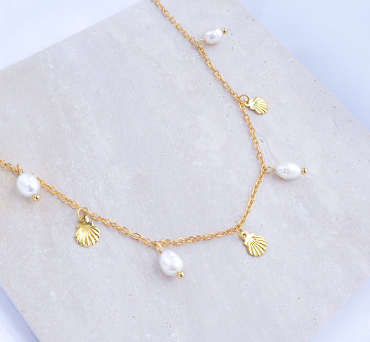 Gold Tiny Shell with Freshwater Pearls on model