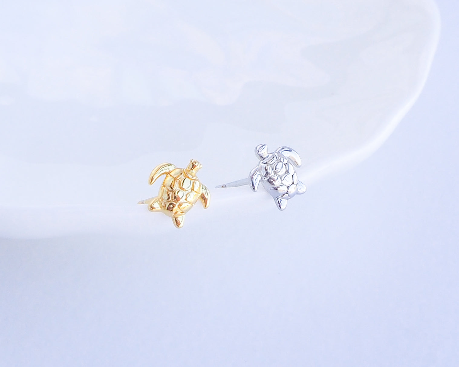 Gold and Silver Tiny Turtle Stud Earrings front view