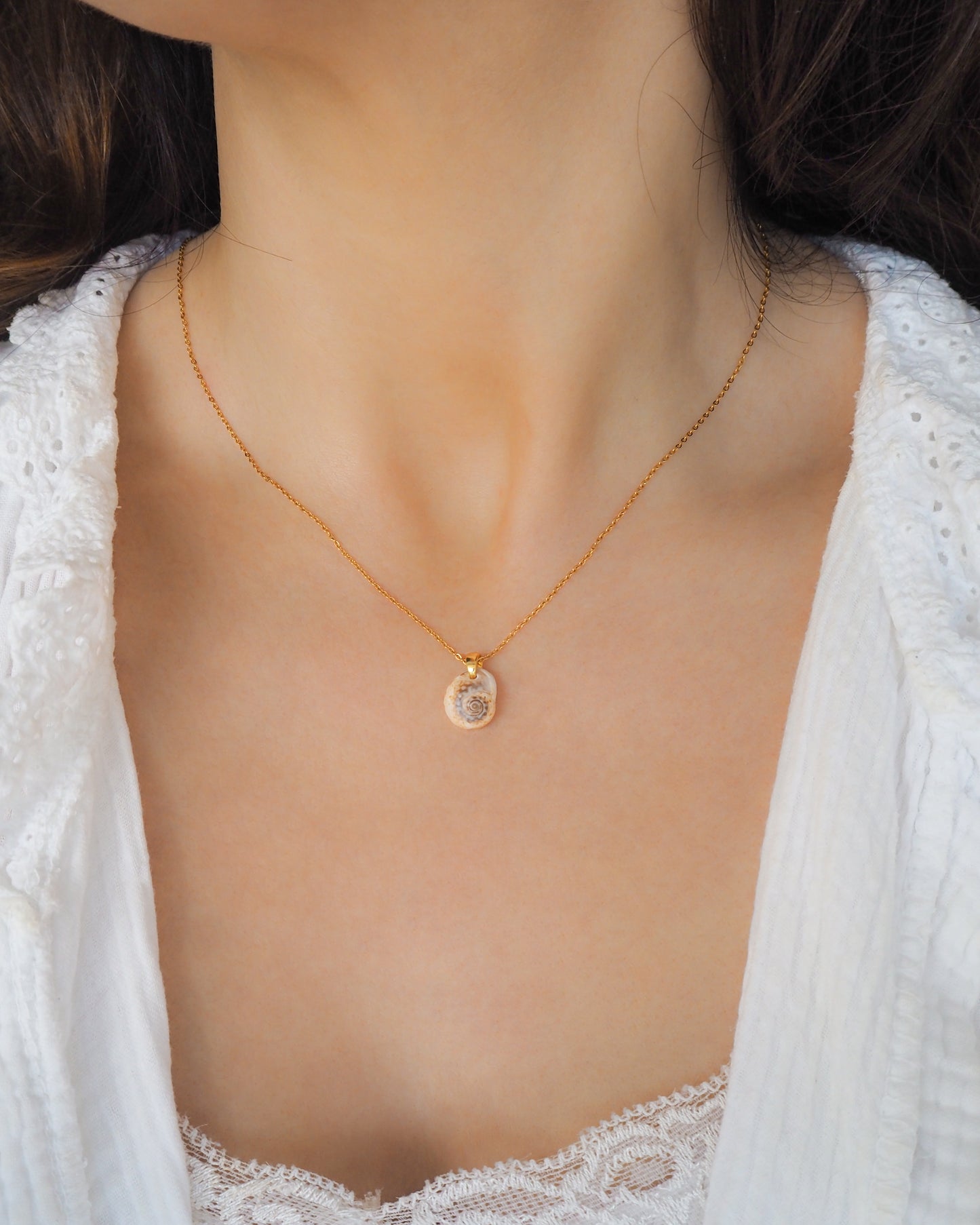 Tritia Neritea Shell Gold Necklace on neck model