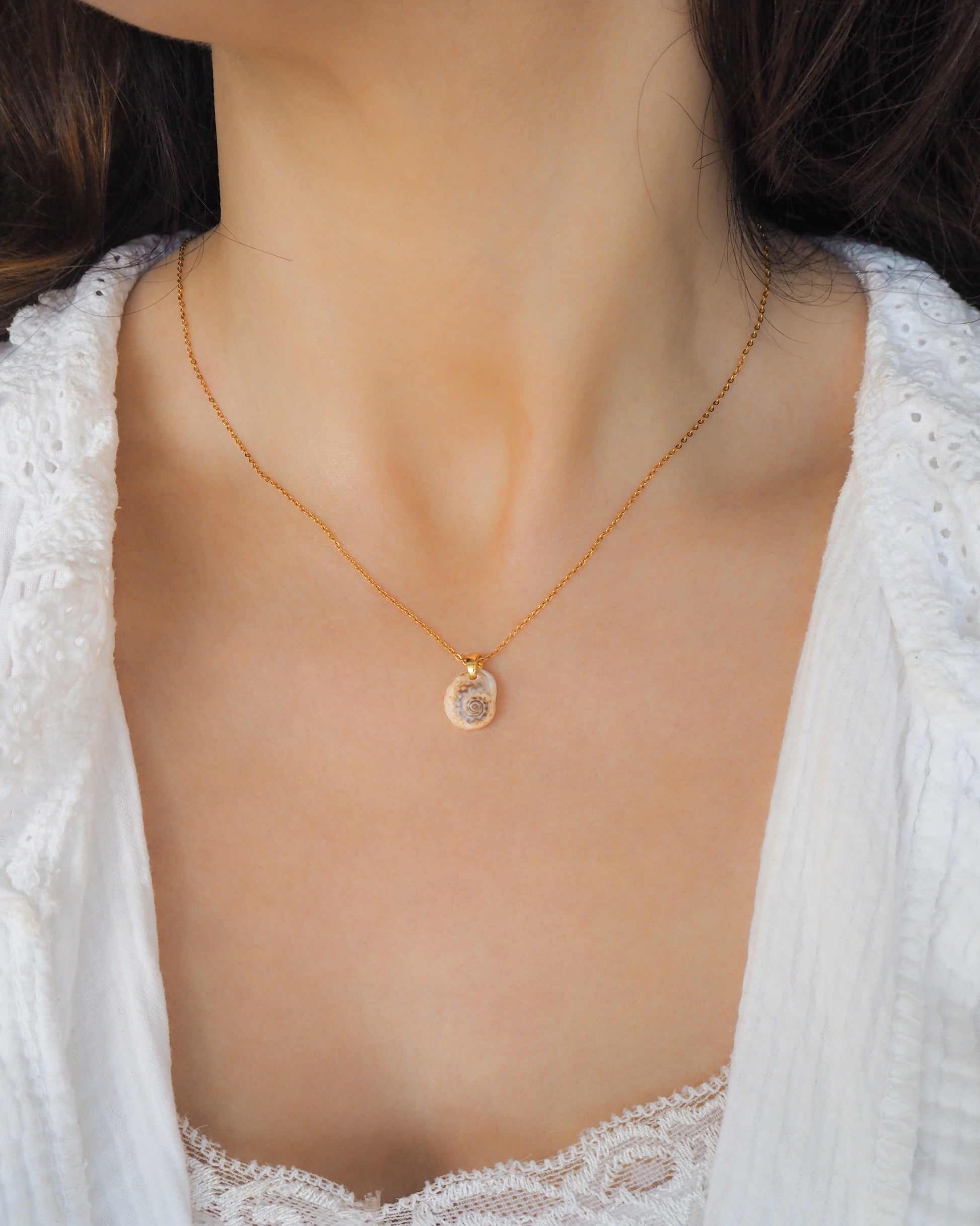 Tritia Neritea Shell Gold Necklace on neck model